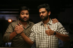 Ashok Selvan and Shiva in the movie 144
